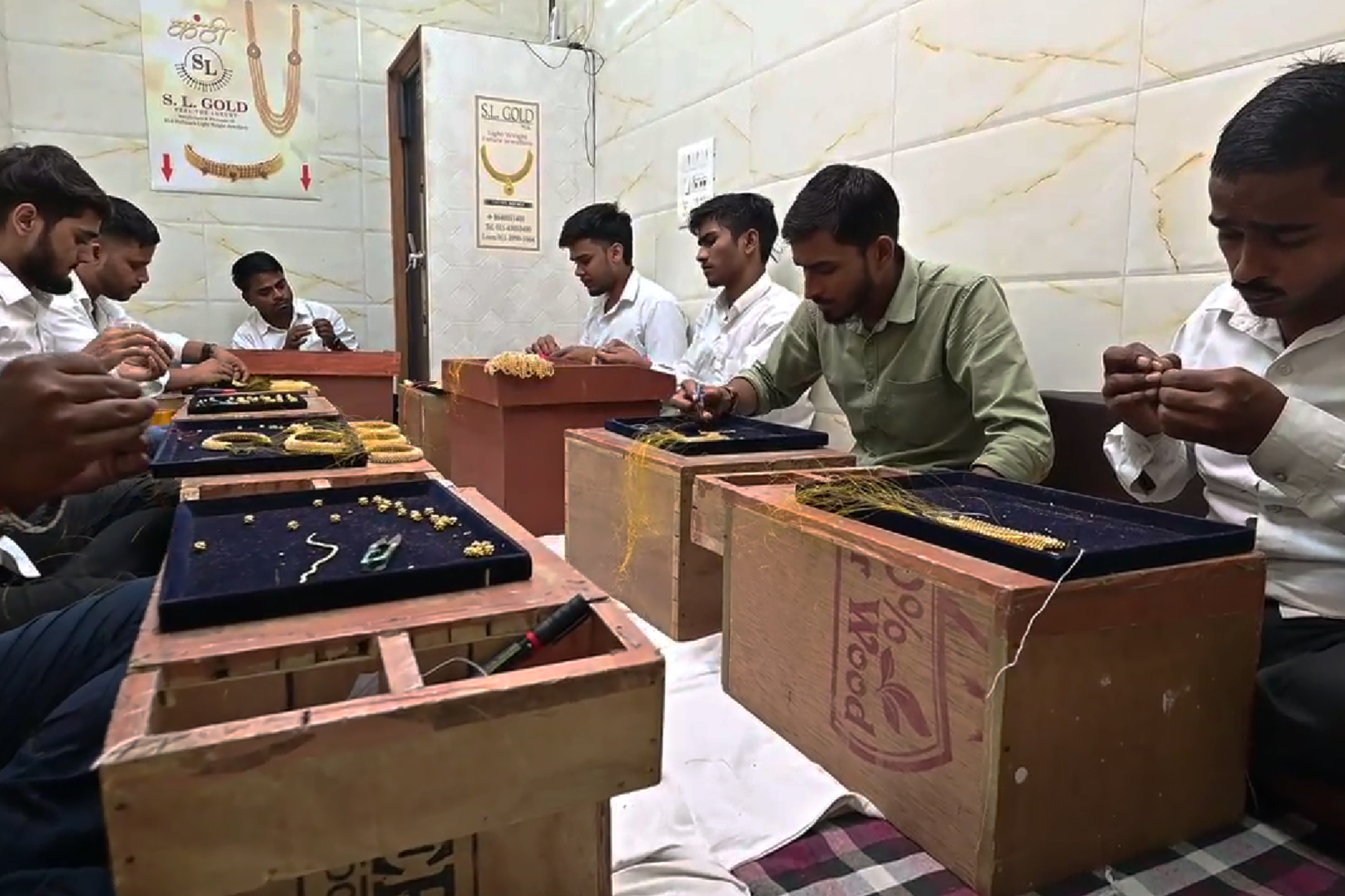 Jeweler's Hands Making Jewelry